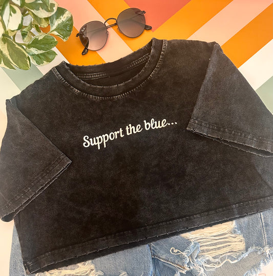 Support the blue crop-top