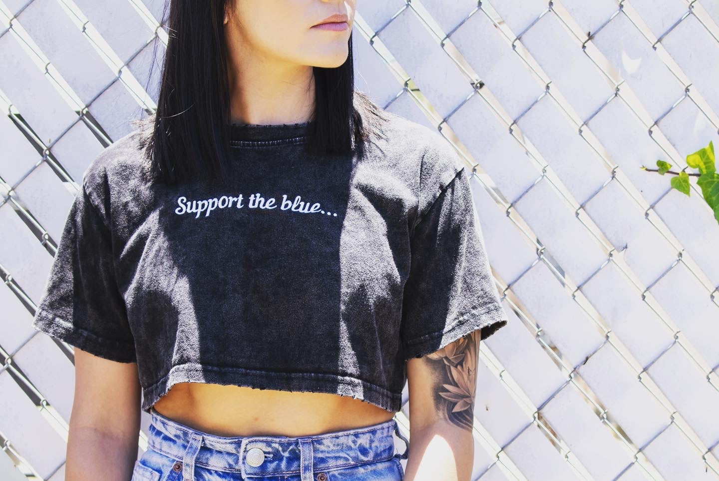 Support the blue crop-top